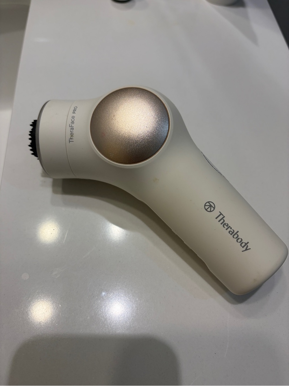 Therabody ThermaFace Pro Facial Device in Ivory with Rose Gold Accent